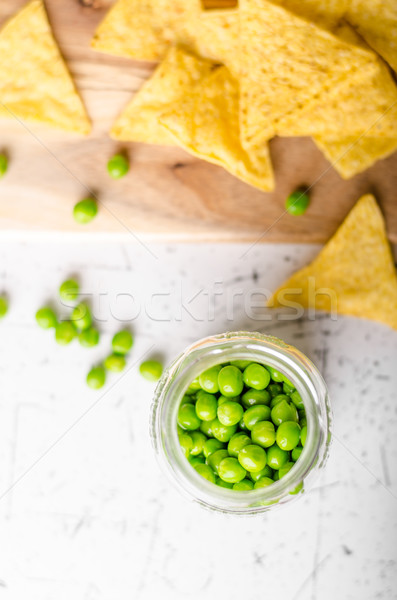 Tortilla batatas fritas ervilhas molho bio pequeno Foto stock © Peteer