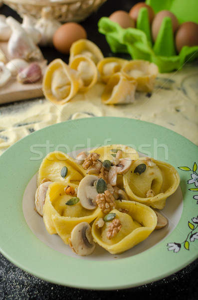 Pasta of the Italian semolina flour - Tortellini Stock photo © Peteer