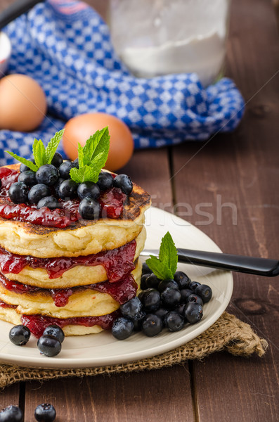 Stock photo: Glutten-free pancakes with jam and blueberries