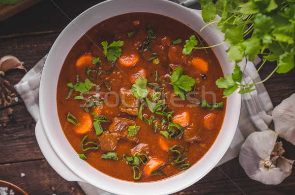 Gulasz wołowy marchew żywności fotografii zioła wewnątrz Zdjęcia stock © Peteer