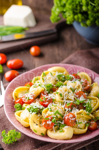 Tortellini ervas tomates fresco queijo comida Foto stock © Peteer