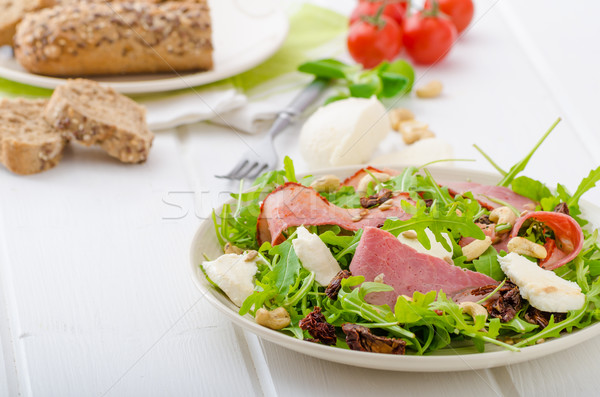 Arugula salad with meat and mozzarella Stock photo © Peteer