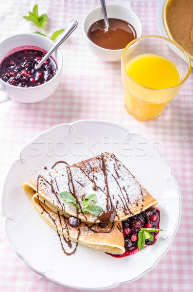 Homemade crepes with berries Stock photo © Peteer