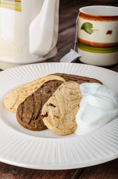 Stock photo: Breakfast home made grain crackers and tea