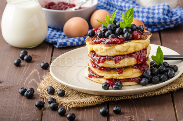 Glutten-free pancakes with jam and blueberries Stock photo © Peteer