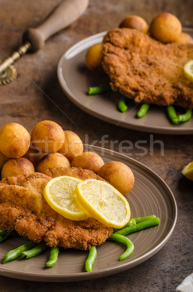 Stock photo: Wiener schnitzel with croquettes