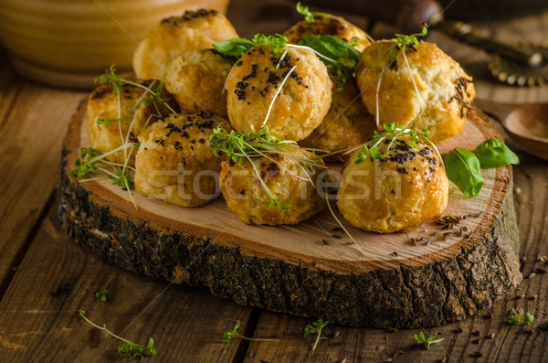 Cheesy bites with blue cheese and pepper Stock photo © Peteer