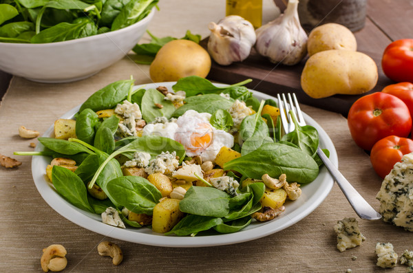 Spinach salad with egg benedict Stock photo © Peteer