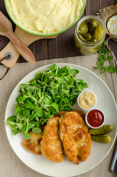 Schnitzel with mashed potatoes and salad Stock photo © Peteer