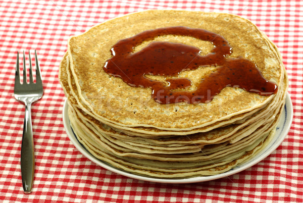 a plate with stacked freshly baked pancakes Stock photo © peter_zijlstra