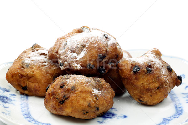 freshly baked dutch traditional oliebollen with currents and powdered sugar Stock photo © peter_zijlstra