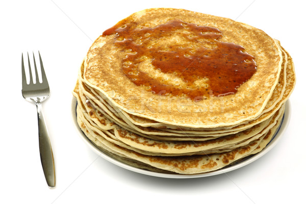 a plate with stacked freshly baked pancakes Stock photo © peter_zijlstra