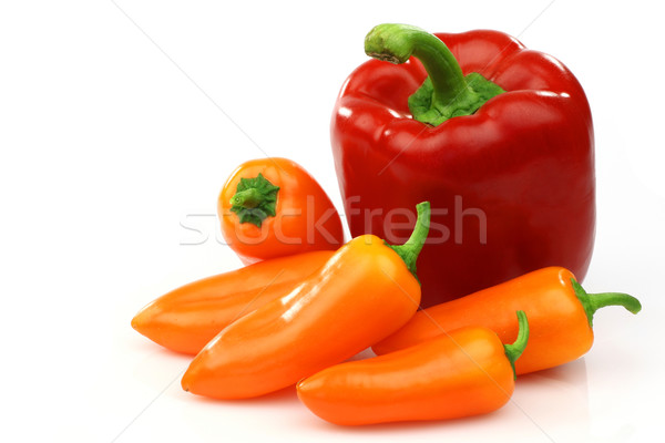 a fresh red and some orange peppers (capsicum) Stock photo © peter_zijlstra