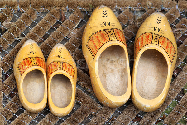 pair of traditional Dutch yellow wooden shoes Stock photo © peter_zijlstra