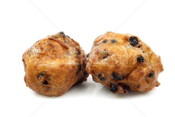 freshly baked traditional dutch oliebollen with currents Stock photo © peter_zijlstra