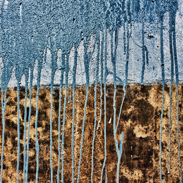 concrete wall with drips of blue paint Stock photo © PetrMalyshev