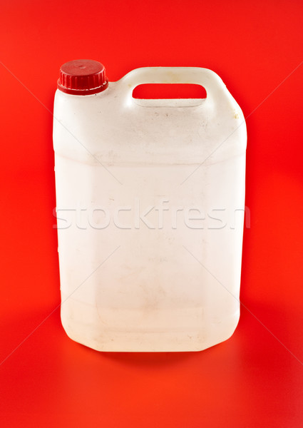 white dusty canister on red  Stock photo © PetrMalyshev