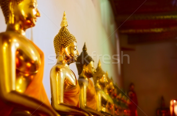 Buddhas in Wat Po Stock photo © PetrMalyshev