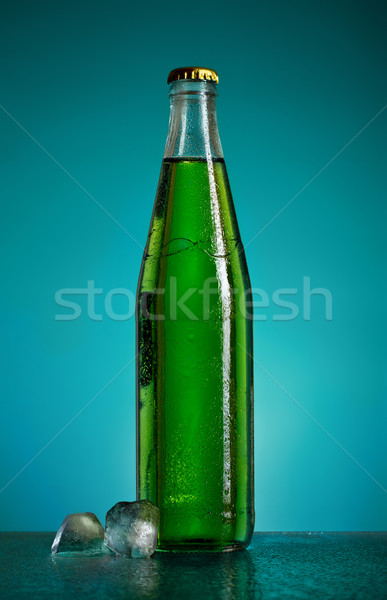 Soda şişe yeşil mavi arka plan Stok fotoğraf © PetrMalyshev