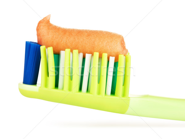 Green Toothbrush With Herbal Toothpaste Stock photo © PetrMalyshev