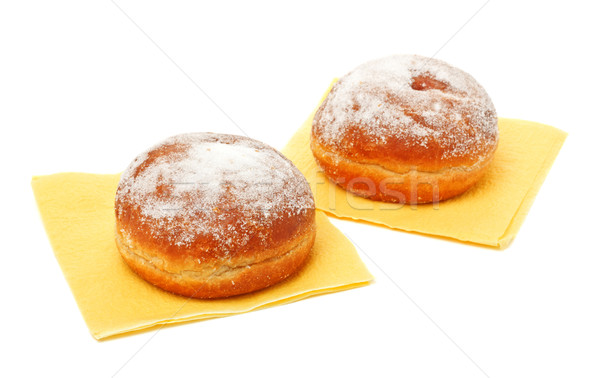 Deux donuts sucre glace papier fond déjeuner Photo stock © PetrMalyshev
