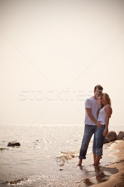 beautiful couple on a seashore Stock photo © PetrMalyshev