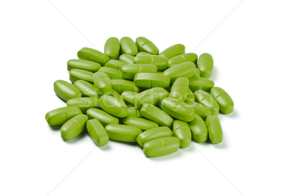 batch of green pills Stock photo © PetrMalyshev