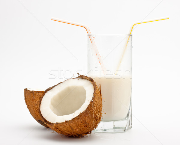 coconut and glass with coco milk Stock photo © PetrMalyshev