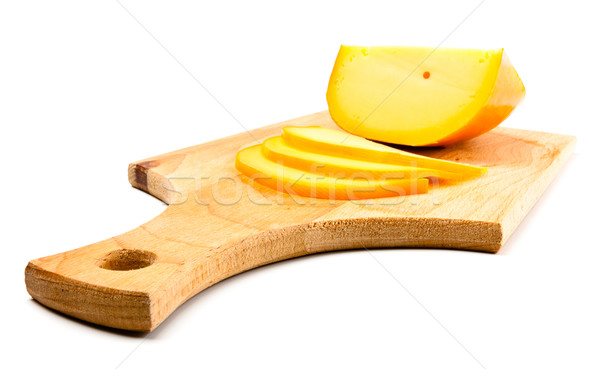 cheese slices on cutting board Stock photo © PetrMalyshev