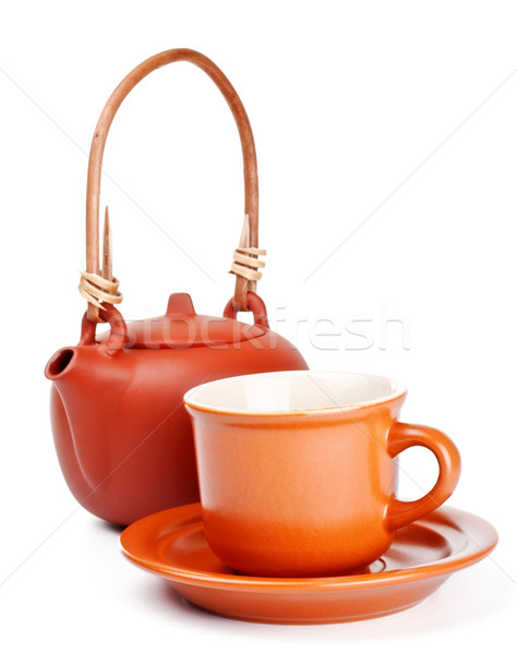 clay kettle and cup with saucer Stock photo © PetrMalyshev