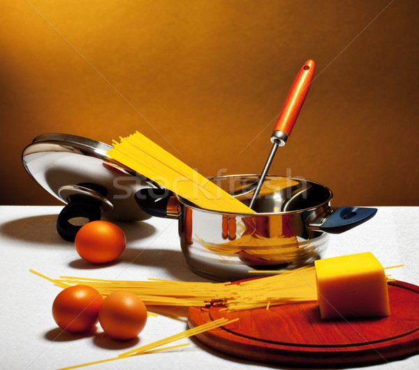 Stock photo: spaghetti, eggs and cheese on table