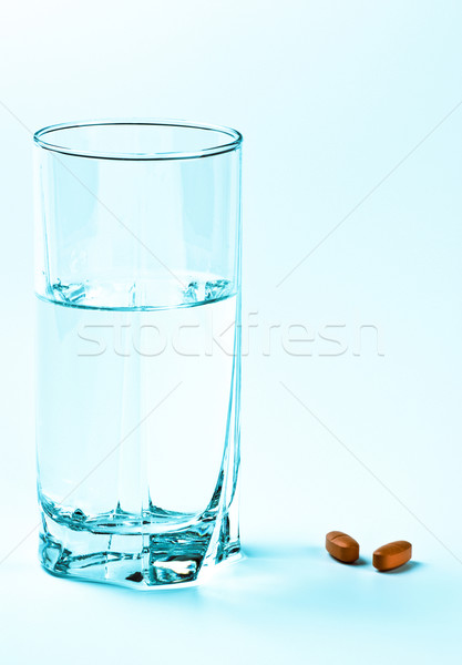 Dois vidro água azul medicina beber Foto stock © PetrMalyshev