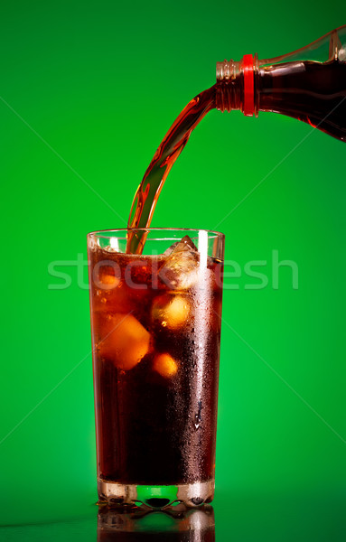 Cola szkła zielone tle pić Zdjęcia stock © PetrMalyshev
