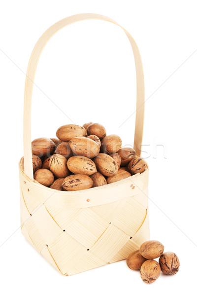 Pecan Nuts In Wooden Basket Stock photo © PetrMalyshev