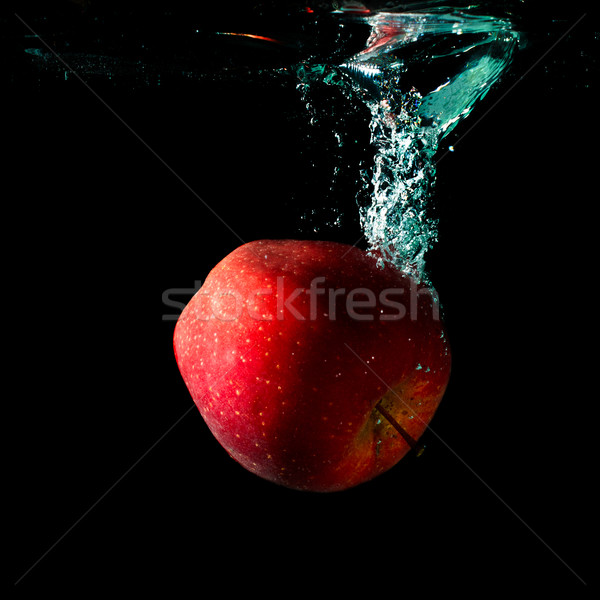 Stock photo: Apple Falling To Water