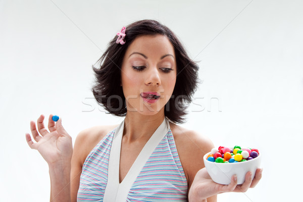 Happy candy girl Stock photo © phakimata