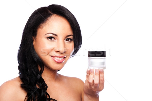 Woman with Skincare moisturizing facial cream Stock photo © phakimata