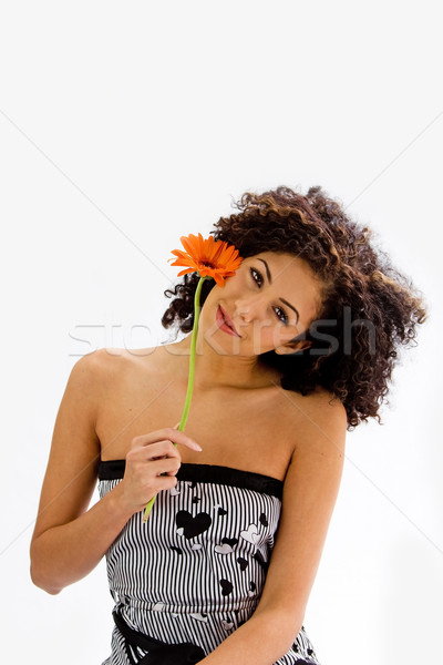 Young girl with flower Stock photo © phakimata