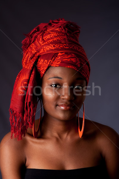 African woman with headwrap Stock photo © phakimata