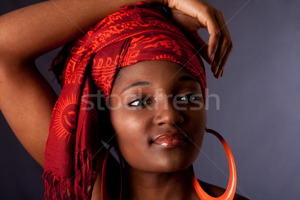 African woman with headwrap Stock photo © phakimata