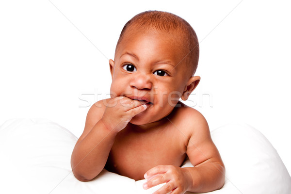 Teething baby biting fingers Stock photo © phakimata