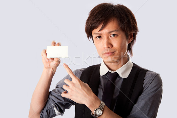 [[stock_photo]]: Asian · homme · d'affaires · pointant · blanche · carte