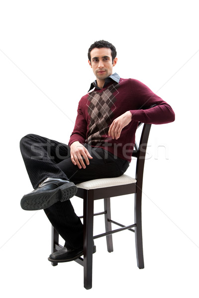 Bello ragazzo seduta sedia indossare business Foto d'archivio © phakimata
