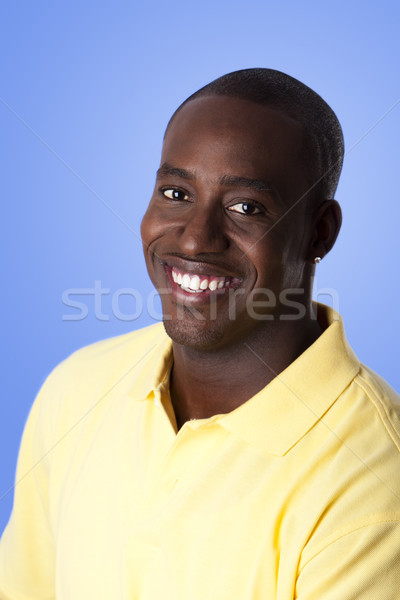 Happy African American man Stock photo © phakimata