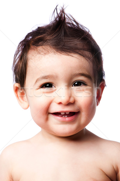 Teething baby toddler with hairstyle Stock photo © phakimata