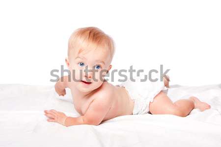 Cute baby laying on belly Stock photo © phakimata