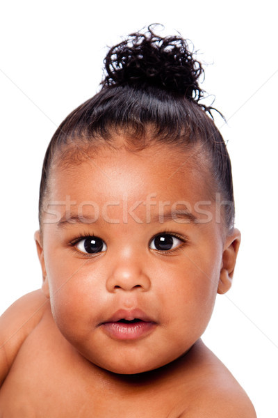 Cute Baby face with hair in bun Stock photo © phakimata