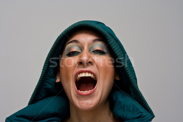 Screeming beauty Stock photo © phakimata