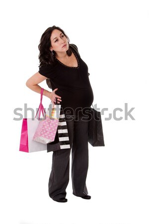 Pregnant woman with shopping bags Stock photo © phakimata