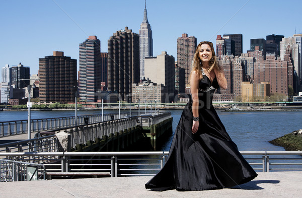 Stock photo: Woman in black cocktail dress